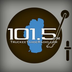 101.5 logo on top of turntable and graphic of lake tahoe